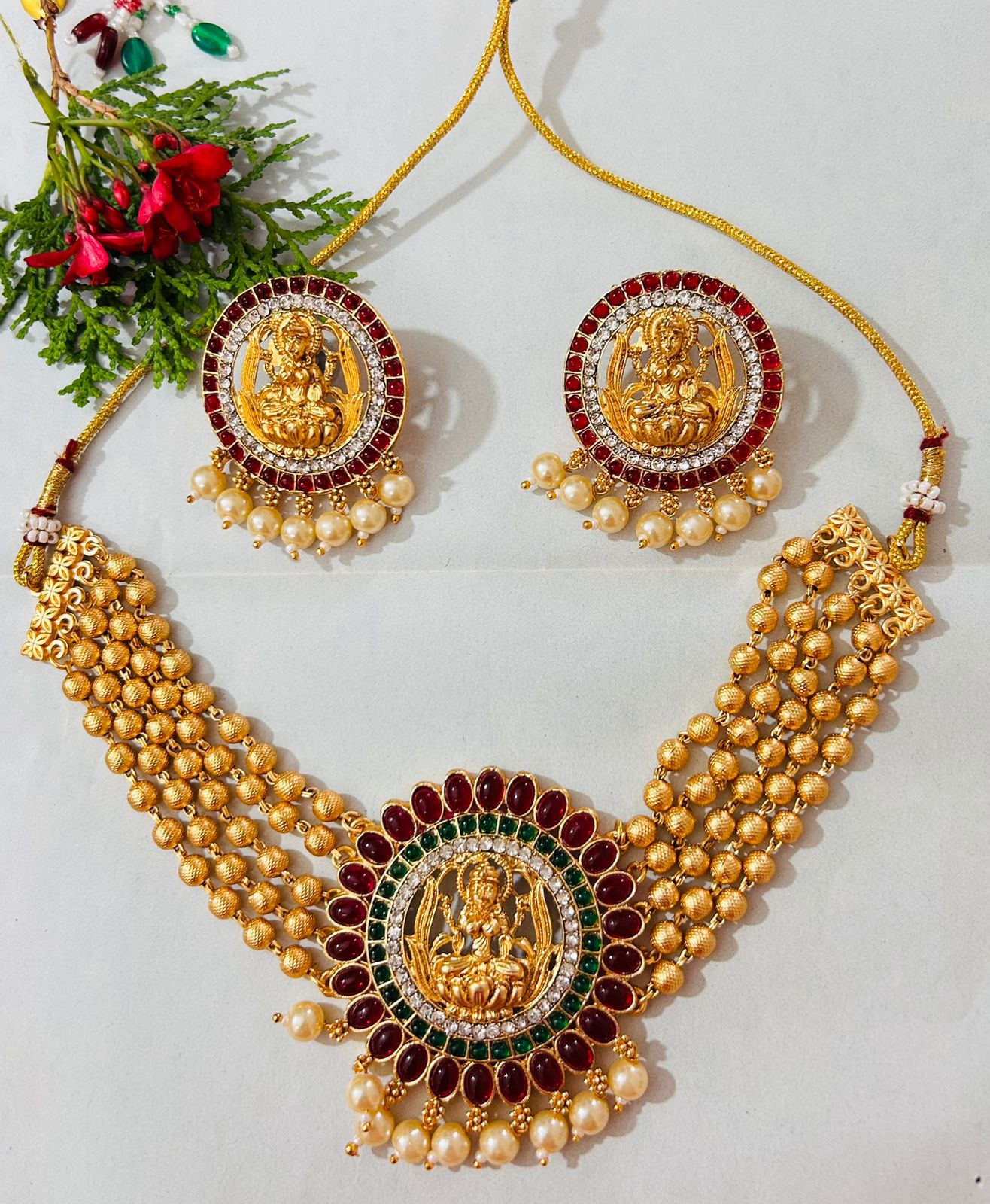 Gold Polished Pearl Choker Necklace with Maa Lakshmi Pendant for Women.